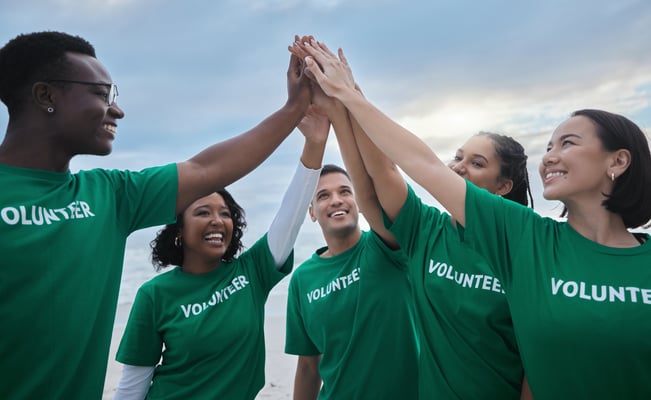 teamwork-high-five-and-volunteer-with-people-on-b-2023-02-15-01-27-37-utc